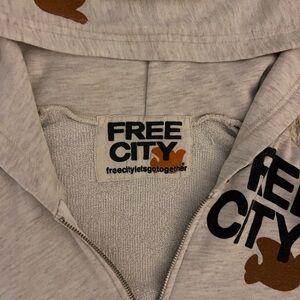 Freecity Cream Hoodie with Black and Brown Accents